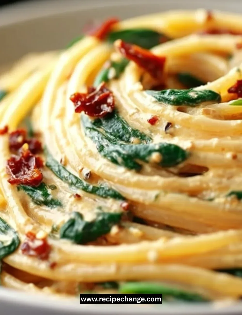 Bowl of Coconut Lime Fish Soup garnished with lime and herbs