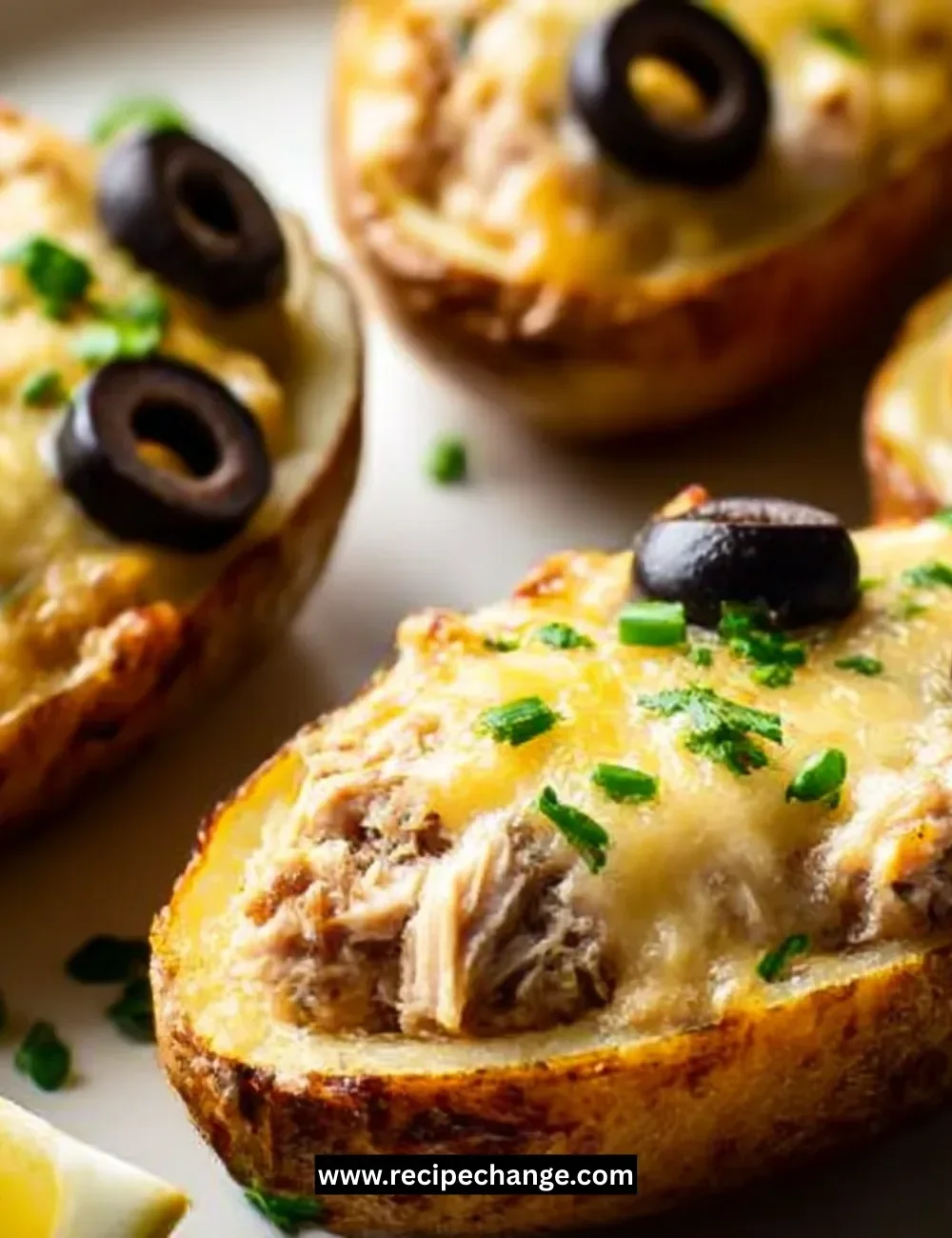 Easy Crock Pot Sloppy Joes served in a bun with toppings