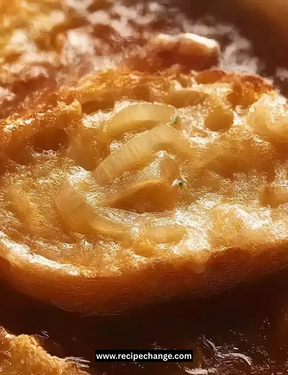 A slice of Pineapple Coconut Cake topped with fresh pineapple and coconut flakes.