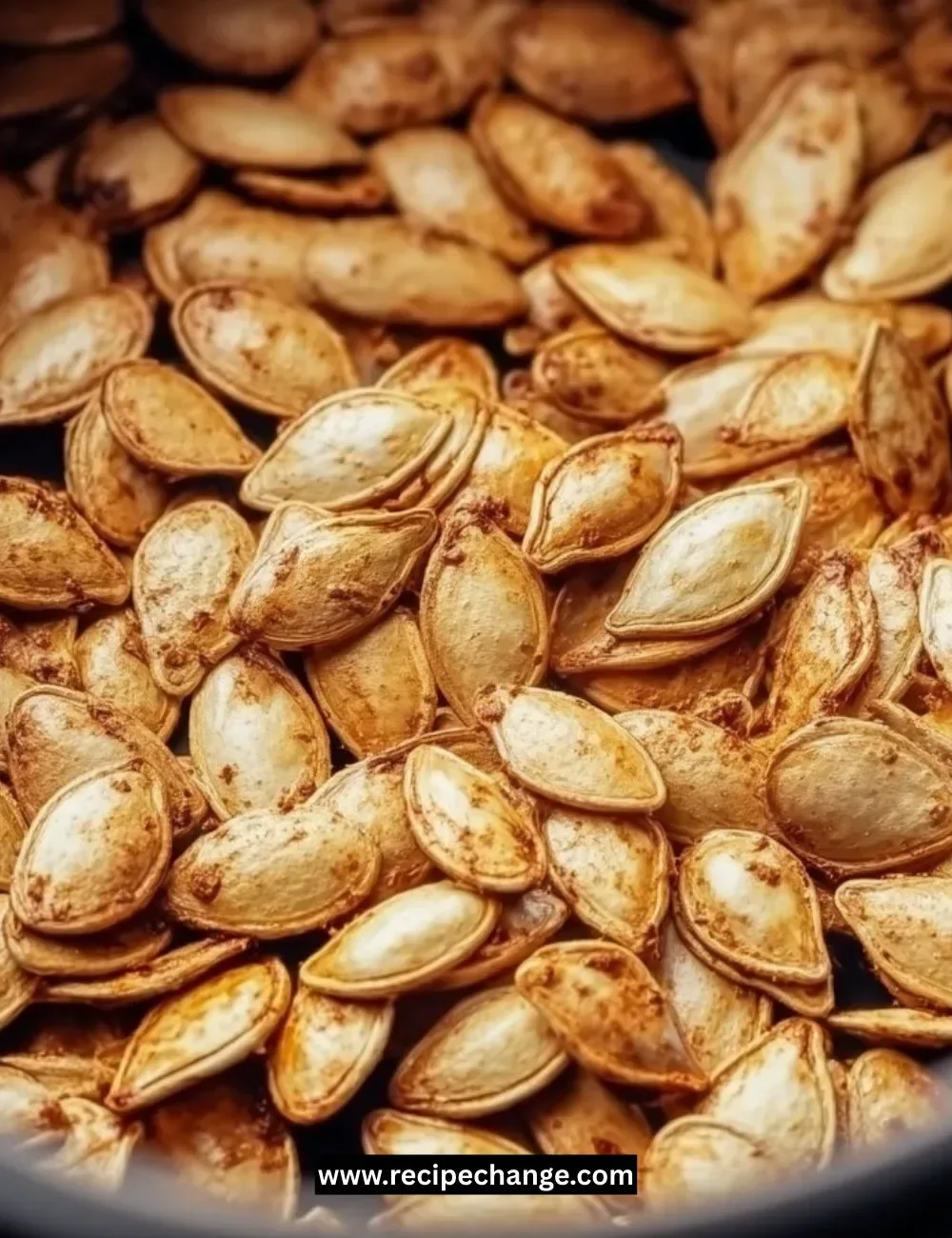 Delicious Million Dollar Ravioli Casserole topped with cheese and herbs