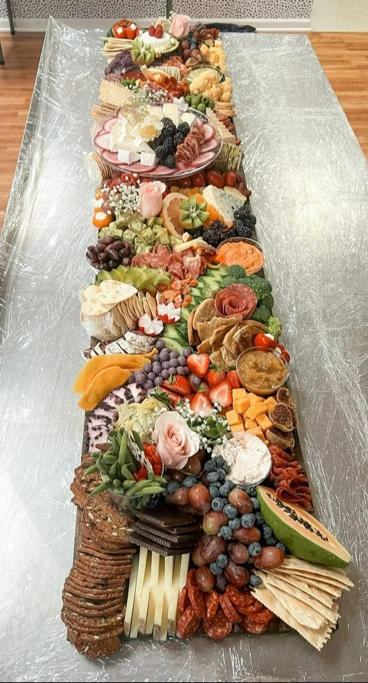 6 foot x 12 inch charcuterie grazing board with assorted meats and cheeses