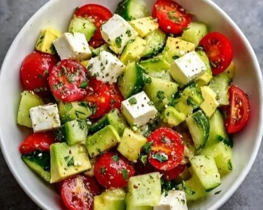 Fresh Avocado Cucumber Tomato Feta Salad with vibrant ingredients