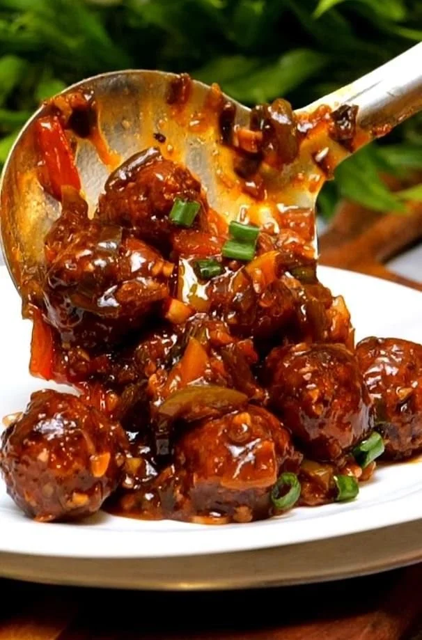 Plate of Cabbage Manchurian garnished with herbs