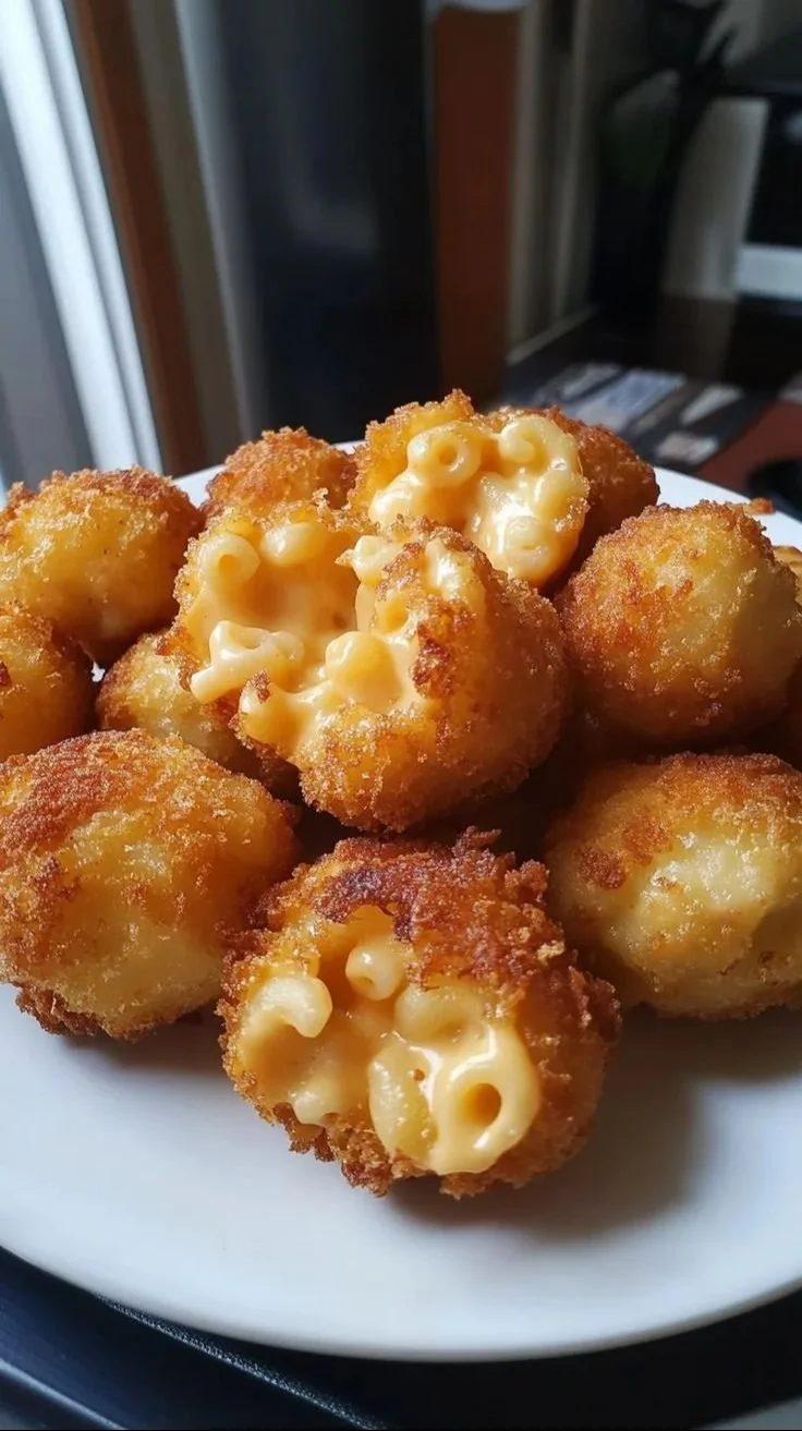 Plate of crispy Fried Mac and Cheese Bites served with dipping sauce