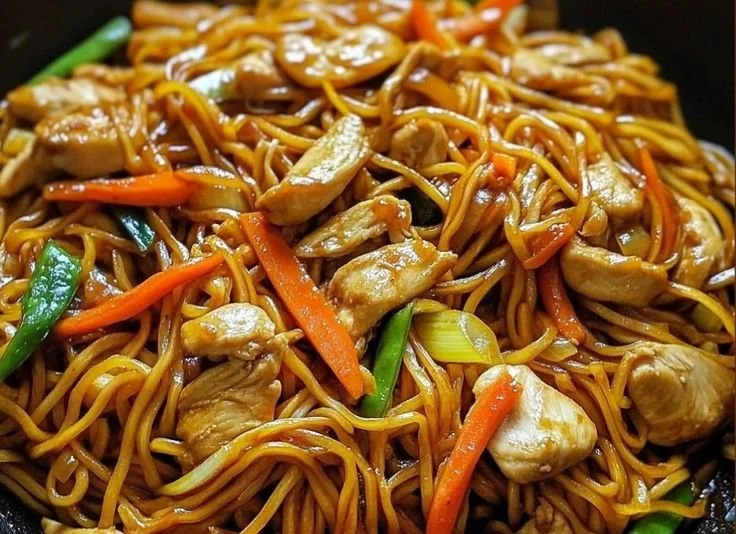 Delicious Chicken Lo Mein dish with colorful vegetables and tender chicken.