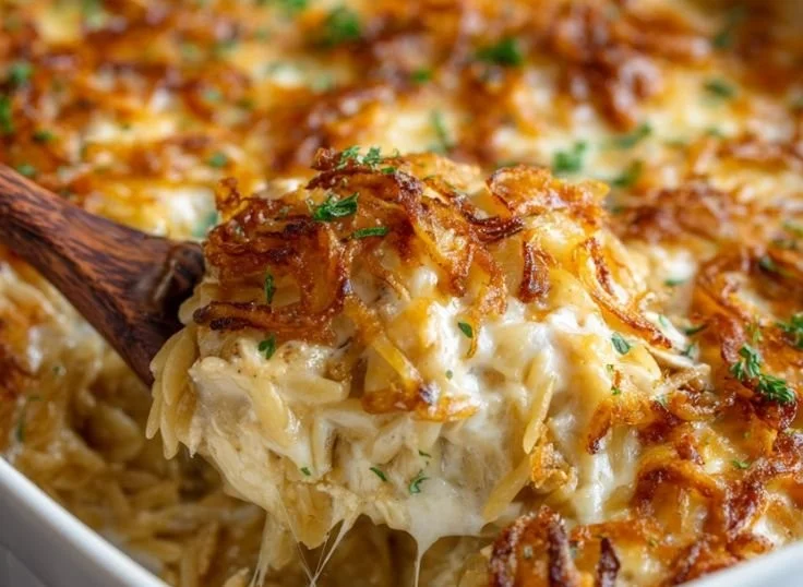 Delicious French Onion Chicken Orzo Casserole served in a baking dish