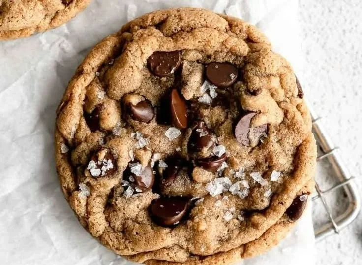 Delicious gluten-free chocolate chip cookies on a rustic wooden table
