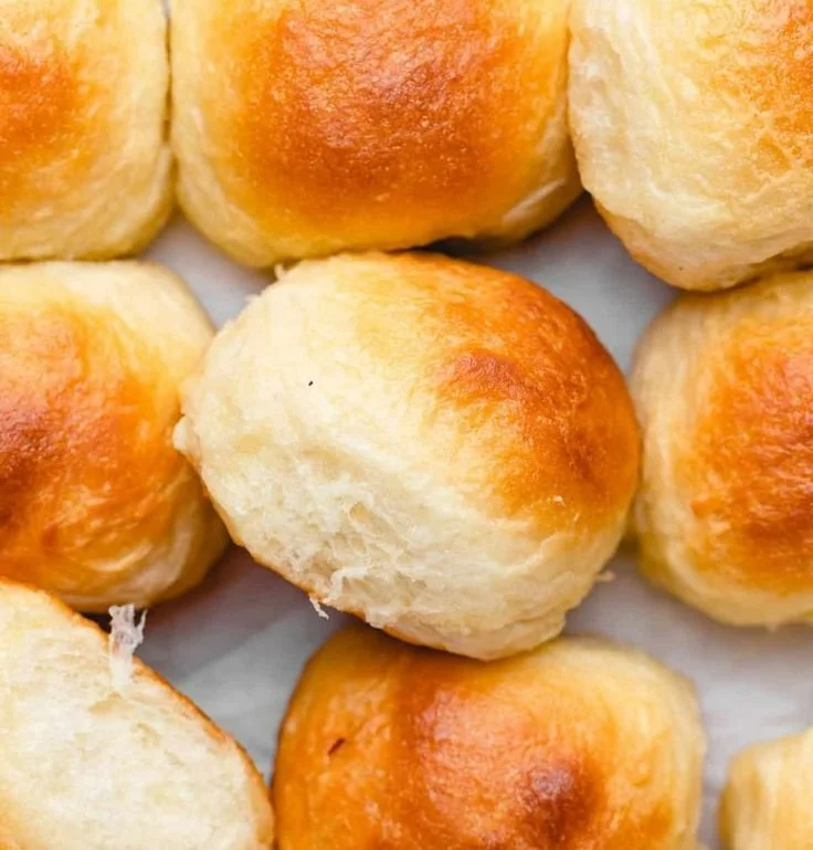 Fluffy homemade vegan dinner rolls fresh out of the oven.