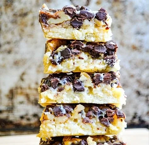 Plate of homemade Magic Cookie Bars with chocolate and coconut layers