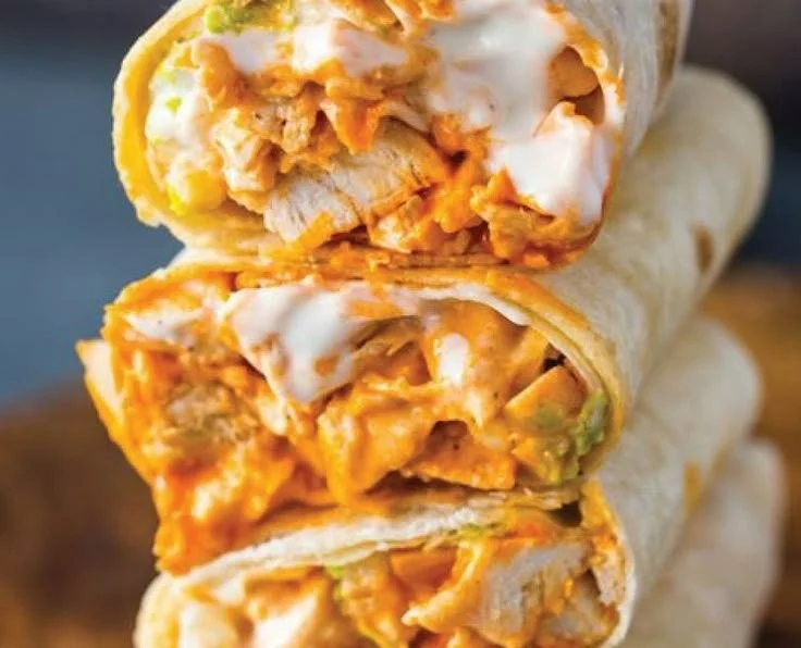 Delicious Ranch Chicken Bake served on a plate with fresh herbs.