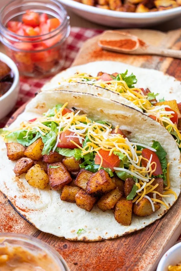 Delicious spicy potato soft taco topped with fresh ingredients