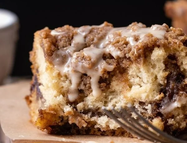 Delicious vegan coffee cake served on a rustic wooden table