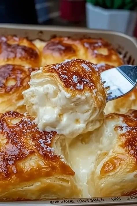 Cheesecake crescent rolls casserole served on a plate