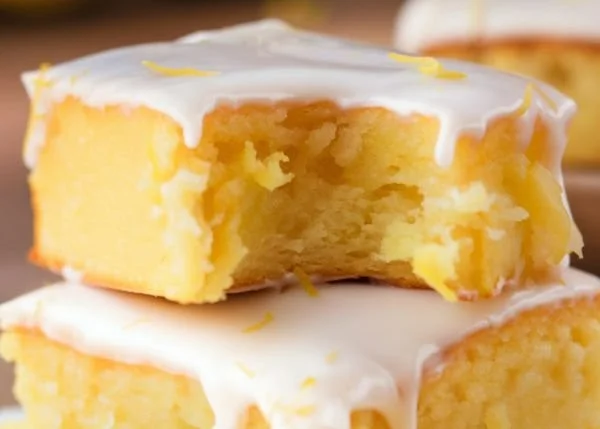 Deliciously baked lemon brownies topped with a zesty glaze.
