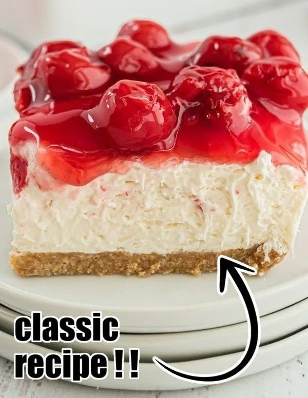 Delicious no bake cherry cheesecake topped with fresh cherries