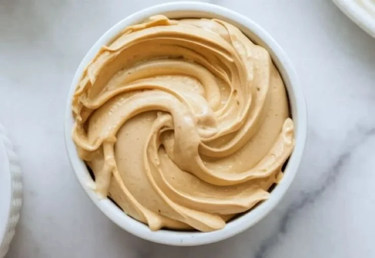 Delicious peanut butter mousse served in a stylish dessert bowl.