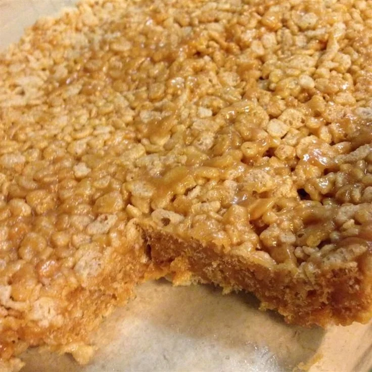 Delicious Peanut Butter Rice Krispie Treats stacked on a plate