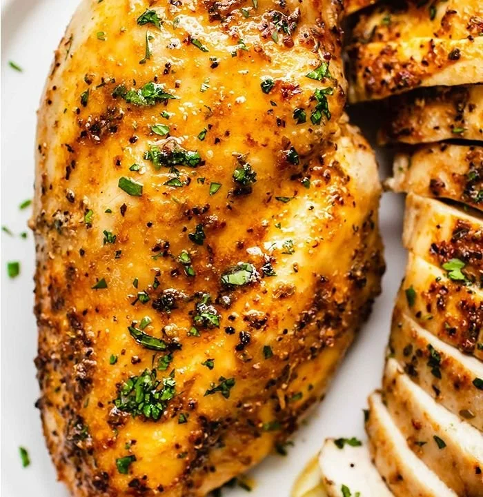 Perfectly cooked air fryer chicken breasts ready to serve.