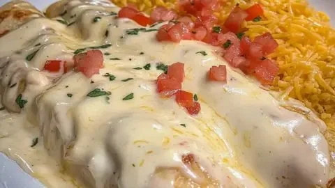 Delicious Cheesy Chicken Enchiladas baked to perfection