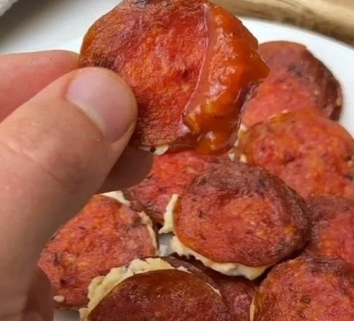 Crunchy pepperoni and cream cheese bites on a platter