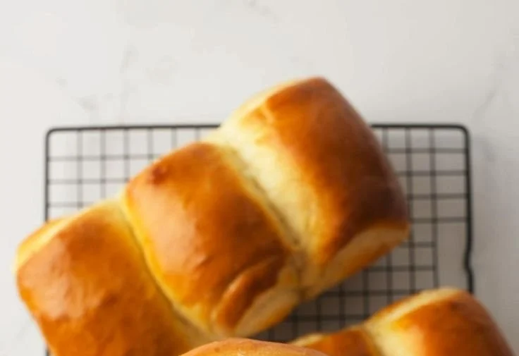 Freshly baked Japanese Milk Bread loaf with a golden crust and soft texture