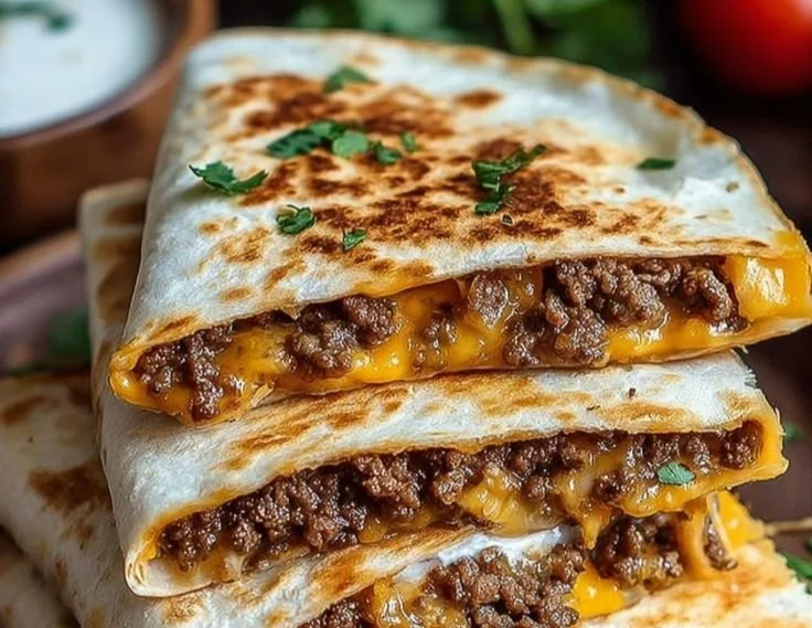 Delicious Smashburger Quesadillas served with salsa and toppings