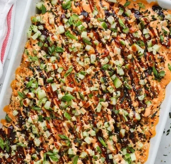 Delicious easy sushi bake served in a dish with toppings