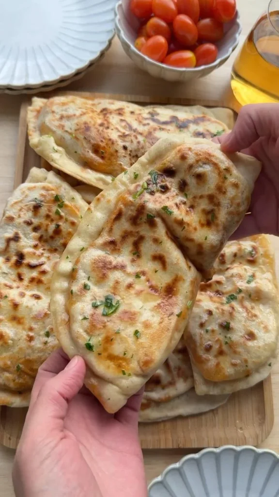 Delicious flatbread topped with creamy butter chicken and spices