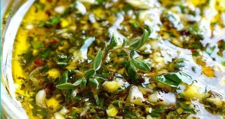 Grilled Greek chicken souvlaki skewers served with tzatziki sauce.