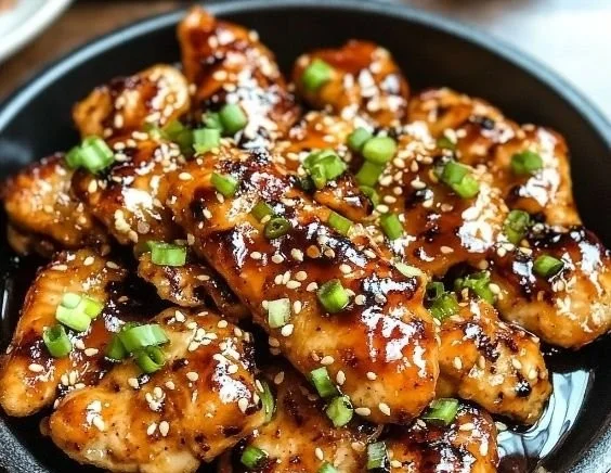 Delicious Korean chicken breasts served with vibrant vegetables.