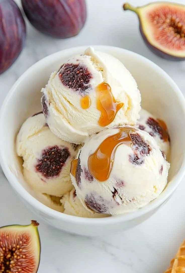 Luscious Fig and Ricotta Ice Cream served in a bowl with fresh figs