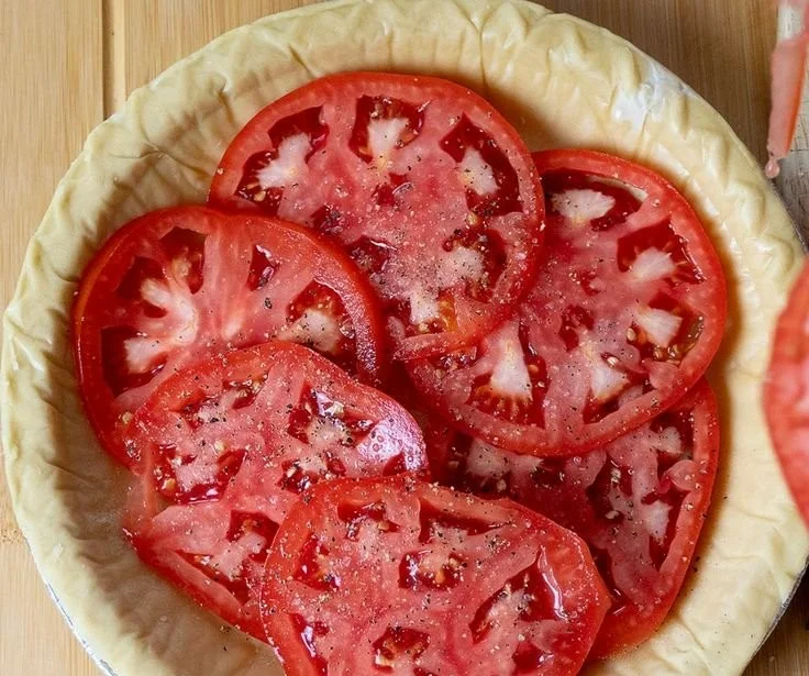 Delicious Southern Tomato Pie made with fresh tomatoes and cheese.