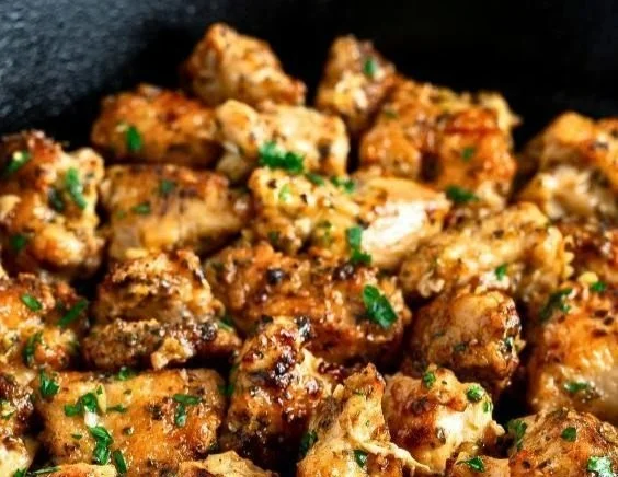 Succulent seasoned chicken breast morsels seared to perfection.