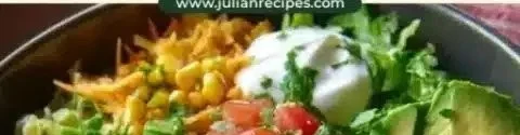 Chicken Enchilada Bowl garnished with fresh cilantro and diced tomatoes